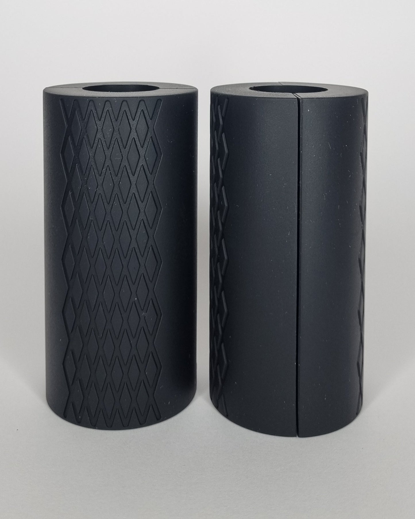 Thick grips boost grip strength and build big arms (front view).